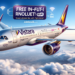Vistara airline aircraft flying above the clouds, showcasing banners on its sides announcing 'Free In-Flight Wi-Fi